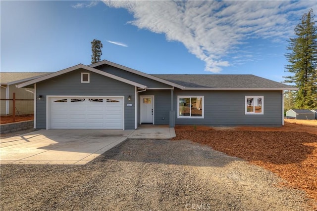 ranch-style home with a garage