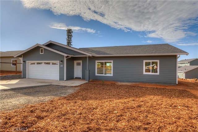 single story home with a garage