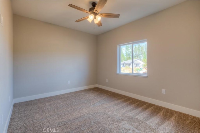 unfurnished room featuring carpet flooring and ceiling fan