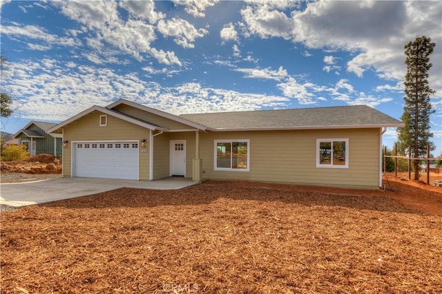 single story home featuring a garage