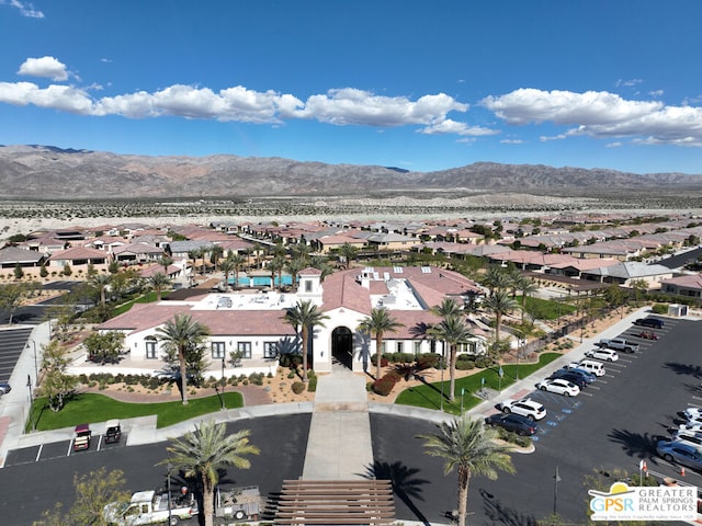 birds eye view of property featuring a mountain view