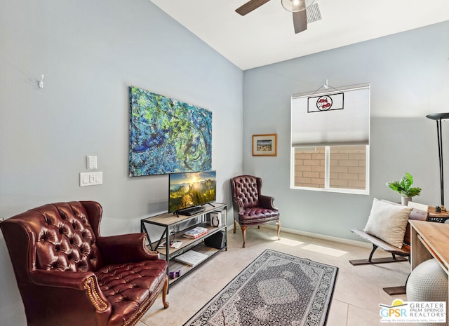 sitting room featuring light tile patterned floors and ceiling fan