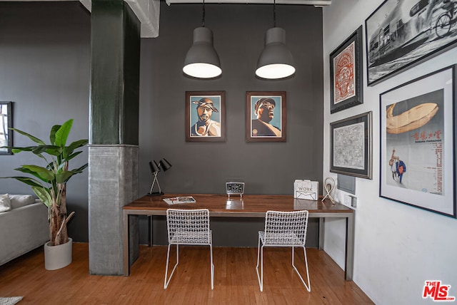 dining area with wood-type flooring