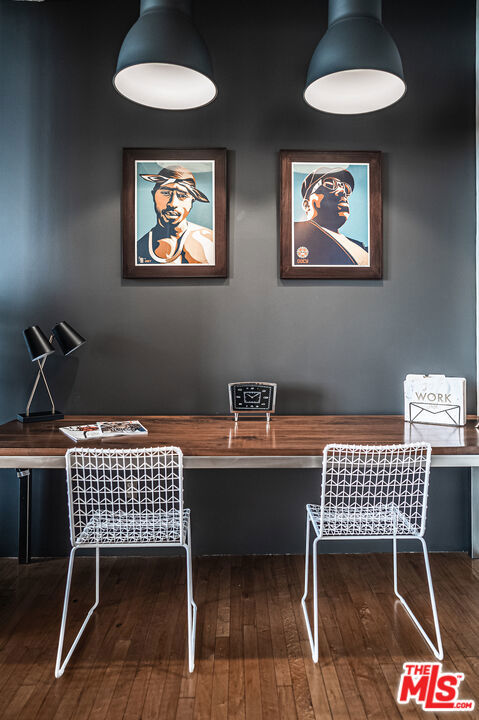 office with dark wood-type flooring