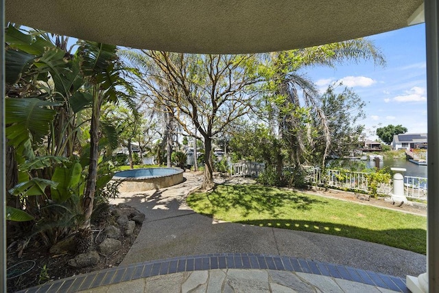 view of yard featuring a water view