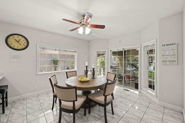 dining area featuring ceiling fan