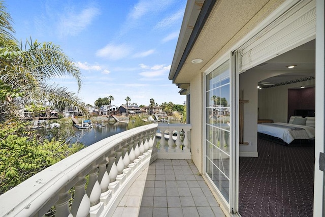 balcony featuring a water view