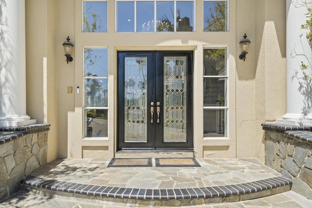 doorway to property with french doors