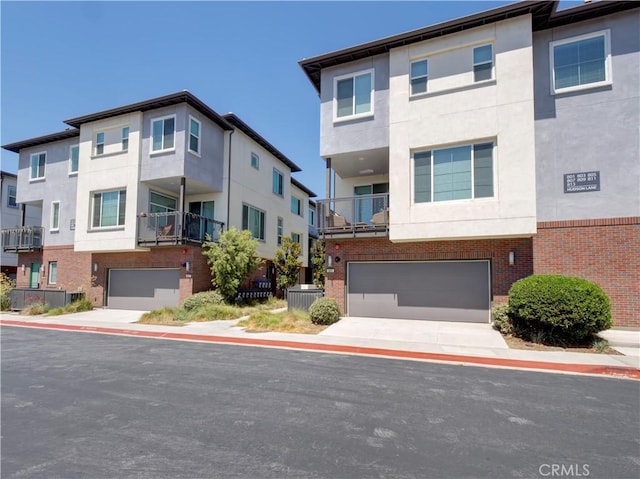 multi unit property featuring a garage and cooling unit