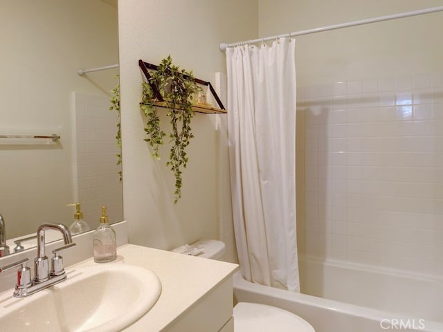 full bathroom with shower / bathtub combination with curtain, vanity, and toilet