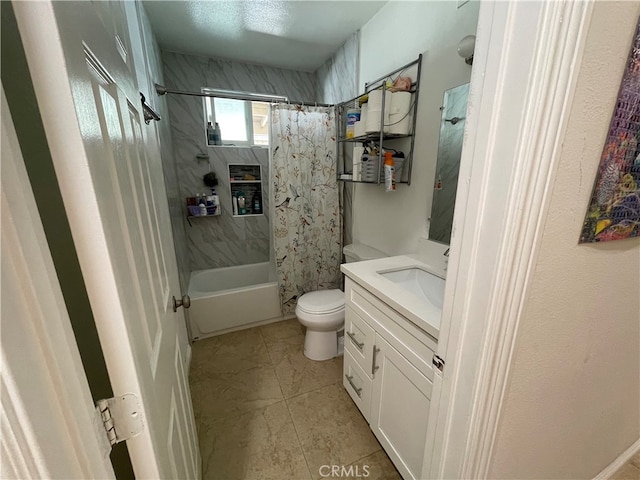 full bathroom featuring vanity, shower / bath combo with shower curtain, toilet, and tile patterned flooring