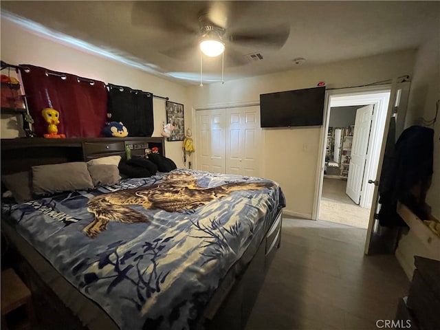 bedroom with a closet and ceiling fan