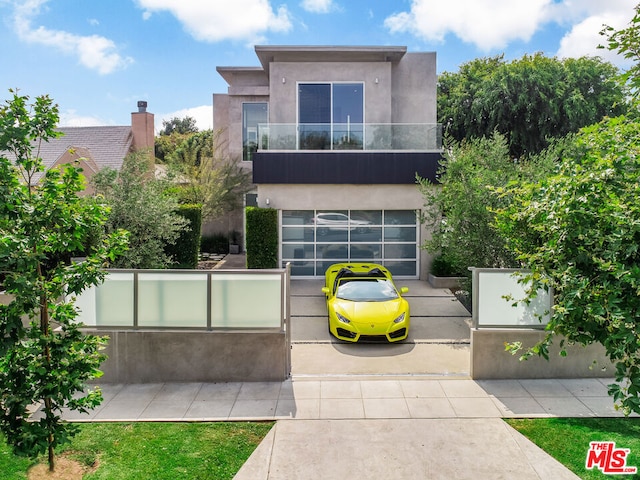 modern home featuring a balcony