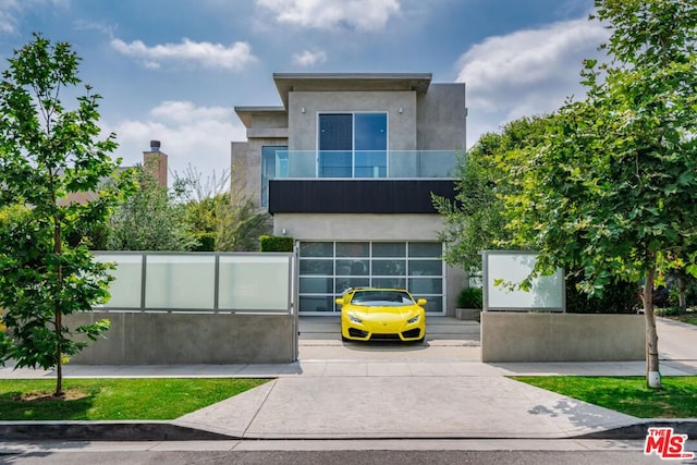 contemporary house featuring a balcony