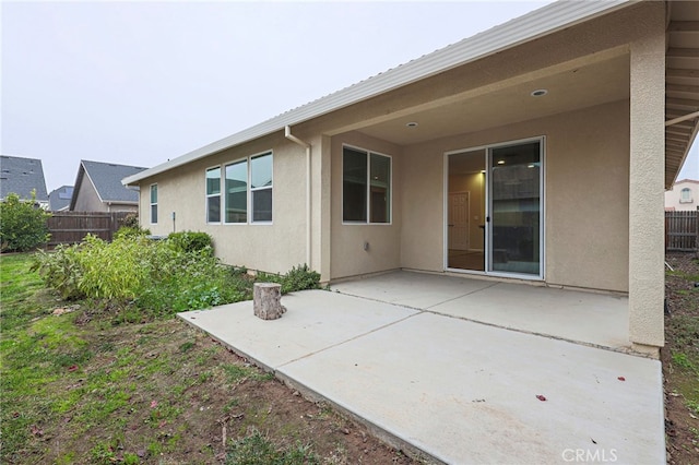 rear view of property with a patio area