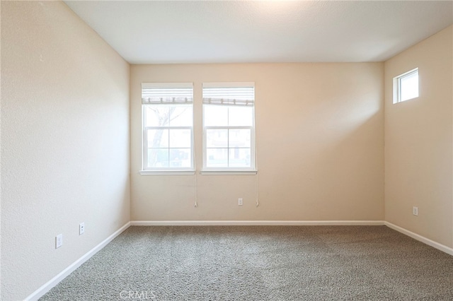 view of carpeted spare room