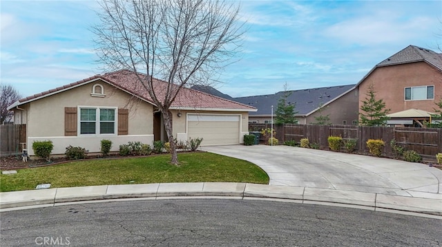 ranch-style house with a garage and a front lawn