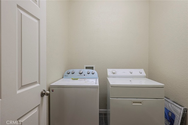 washroom with separate washer and dryer