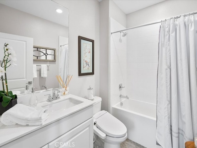 full bathroom featuring shower / bath combination with curtain, vanity, and toilet