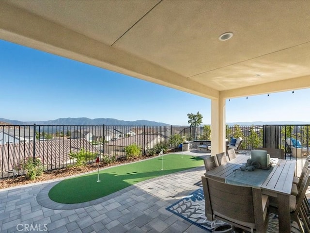 view of patio with a mountain view