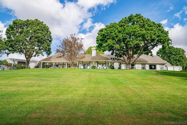 exterior space featuring a front lawn