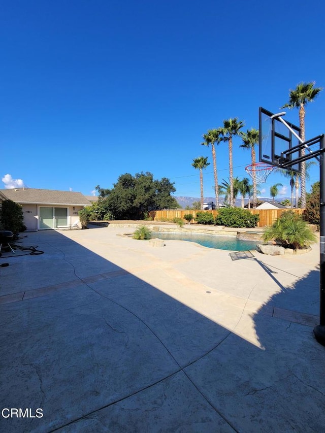 view of patio / terrace featuring basketball court