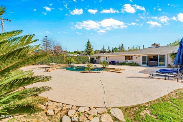 view of pool with a patio area and a fenced in pool