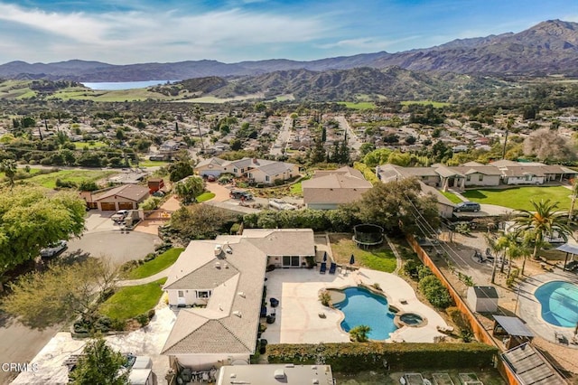 drone / aerial view with a mountain view and a residential view