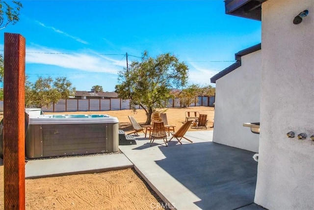 61853 Grand View Cir, Joshua Tree, CA 92252 - view of patio / terrace with fence and a hot tub