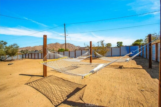 61853 Grand View Cir, Joshua Tree, CA 92252 - view of yard featuring fence and a mountain view