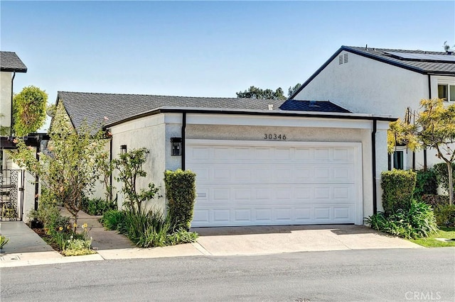 exterior space featuring concrete driveway