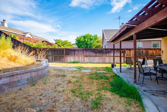 view of yard with a patio and a pergola