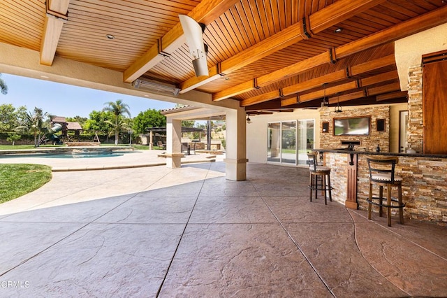 view of patio / terrace with a bar