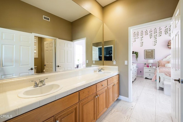 bathroom featuring vanity