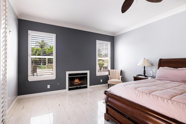 bedroom with ceiling fan and ornamental molding