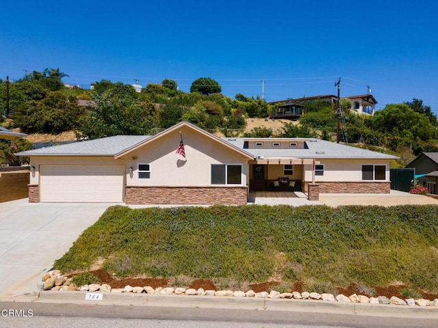 view of front of property with a garage