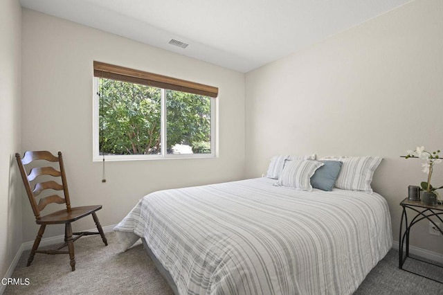 bedroom featuring carpet