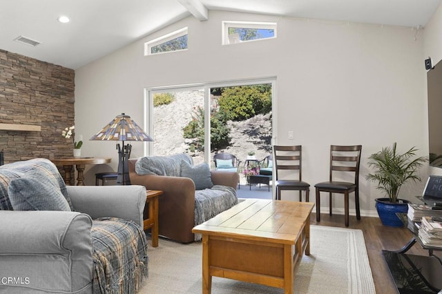 living room with beamed ceiling, wood-type flooring, and high vaulted ceiling