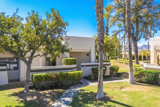 exterior space featuring a front yard