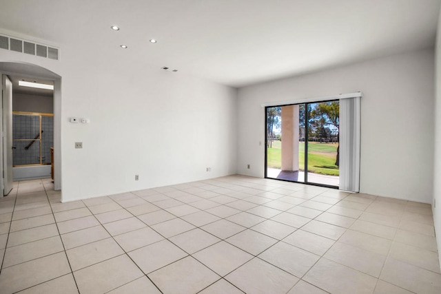 view of tiled spare room