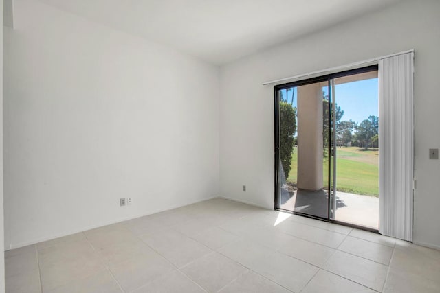 empty room with light tile patterned floors