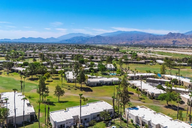 birds eye view of property featuring a mountain view