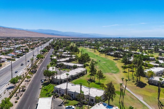 birds eye view of property featuring a mountain view