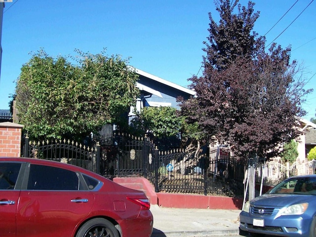 view of property hidden behind natural elements