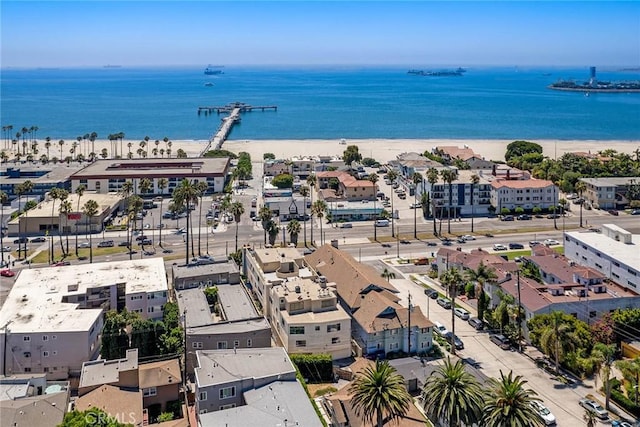 bird's eye view with a water view and a view of the beach