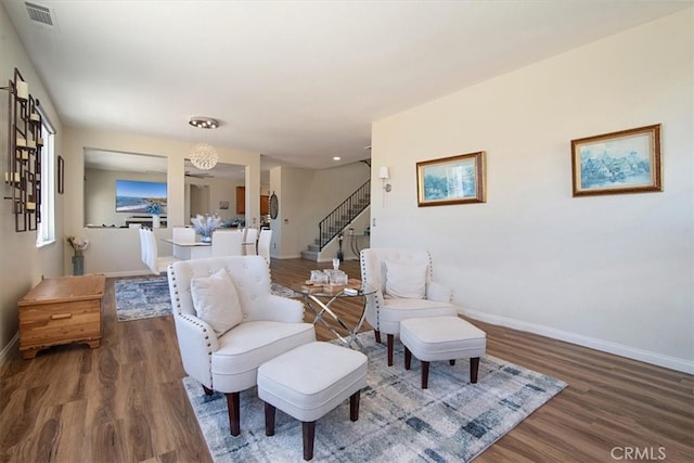 living room with dark hardwood / wood-style floors