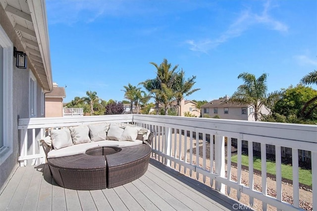 wooden deck featuring an outdoor hangout area