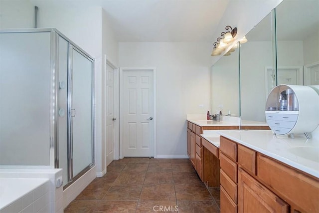 bathroom featuring plus walk in shower and vanity