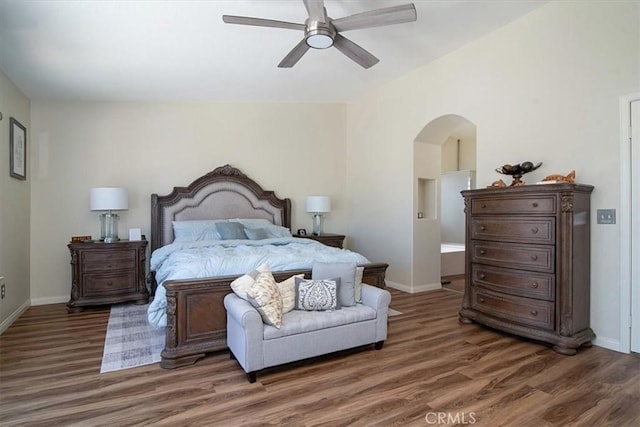 bedroom with ceiling fan and dark wood-type flooring