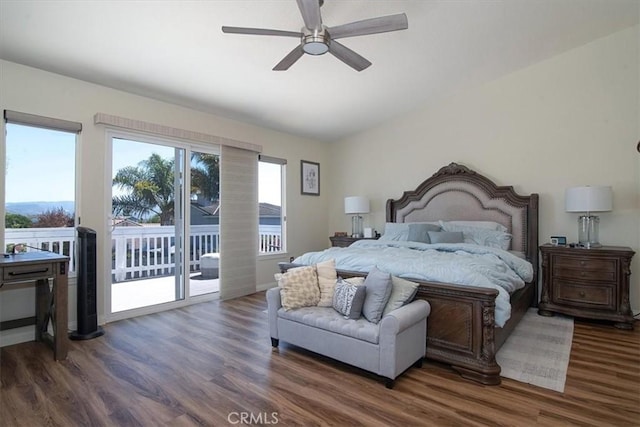 bedroom with access to exterior, ceiling fan, and dark hardwood / wood-style flooring